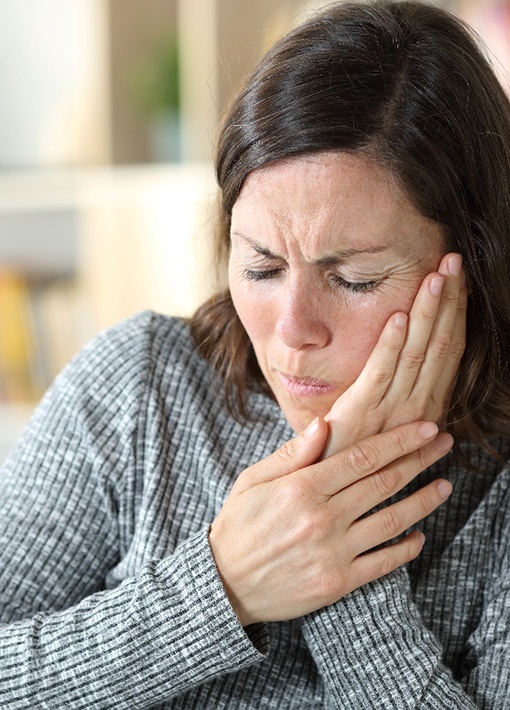 Woman with a toothache in Hampton