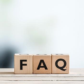 three wooden blocks that spell out 'FAQ' 