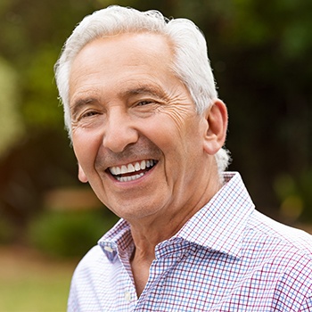 Older man with flawless smile