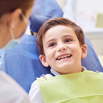 Smiling child in dental chair