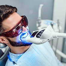Man having his teeth whitened